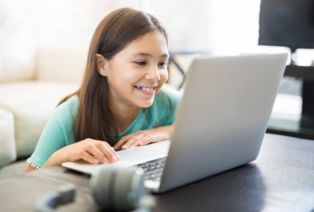 Little girl with laptop